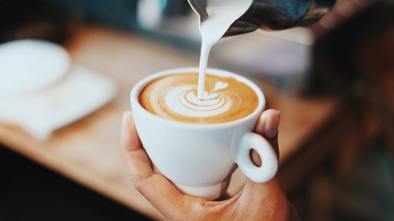 Artisan brewed cup of specialty coffee with tulip latte art